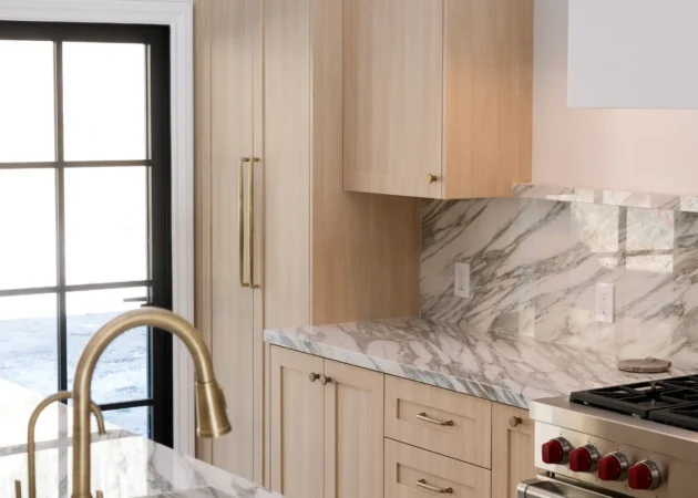 Brass faucet, stone counters and tall shaker cabinets, Bel Air Project by Home Deco