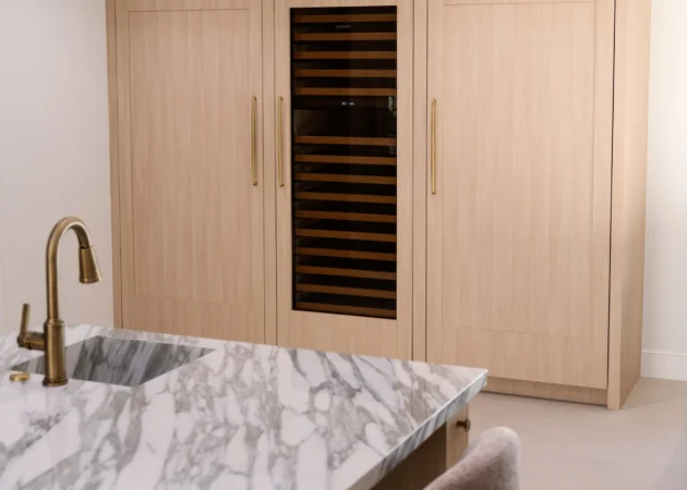 Paneled refrigerator wall with wine column, Bel Air Project by Home Deco