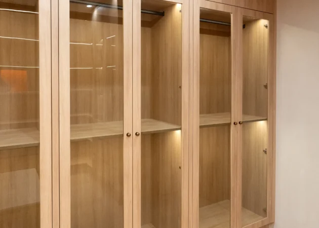 Closet wall with glass-front wardrobes, Dickens Project by Home Deco