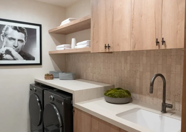 Laundry room with wood cabinets and sink, Dickens Project by Home Deco