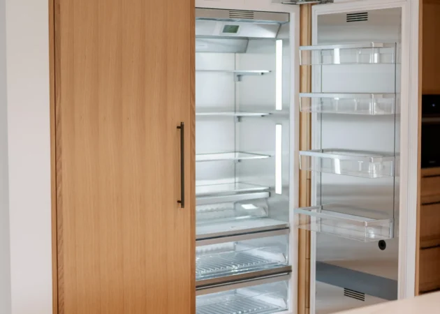 Paneled column refrigerator, doors open, Lynngrove Project by Home Deco