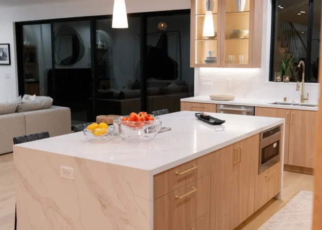 Waterfall island with wood cabinetry, Sancola Project by Home Deco
